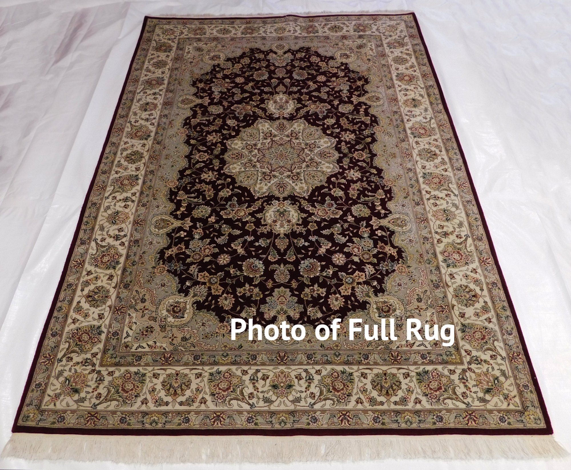 A full photograph of a Persian rug submitted for valuation